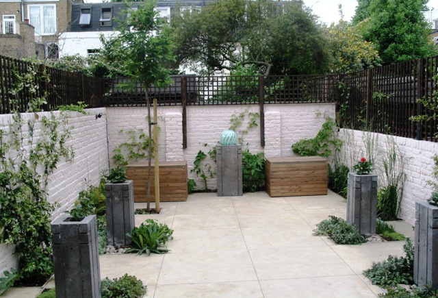 Garden with Concrete Planters, Water Feature and Polished Concrete ...