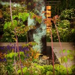 Patinated Copper archway - RHS Chelsea flower show 2014